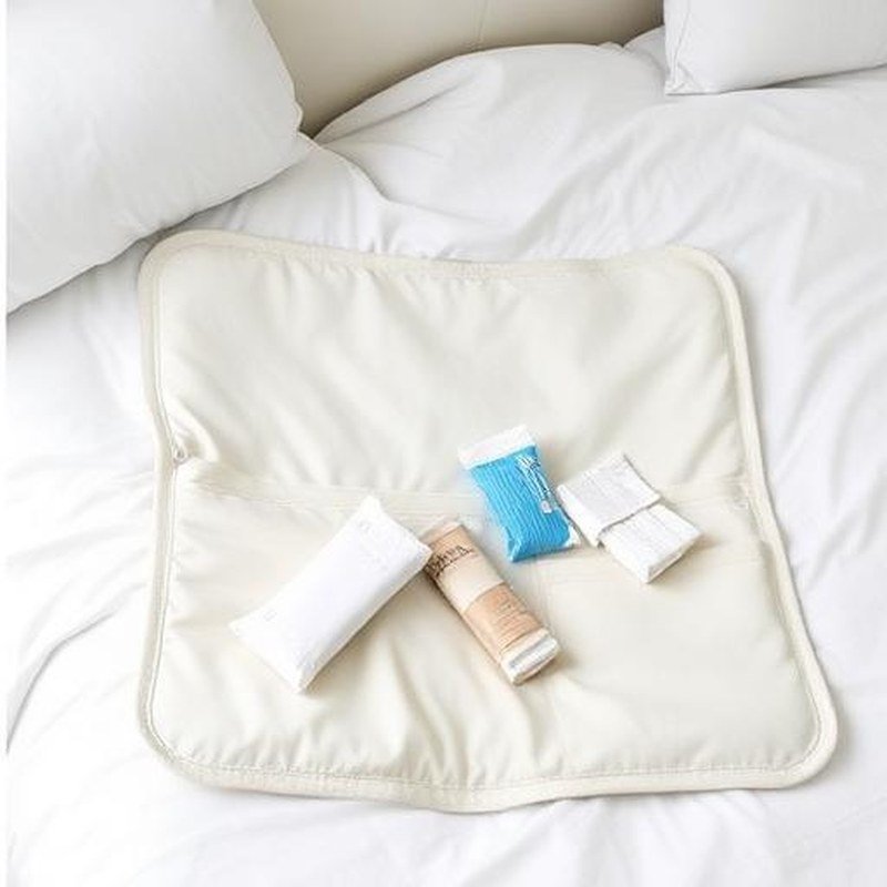 Foldable Compact Baby Changing Pad with Pockets - In use